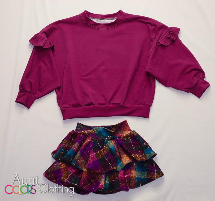 ACC Model Search - fall over side top and ruffle skirt